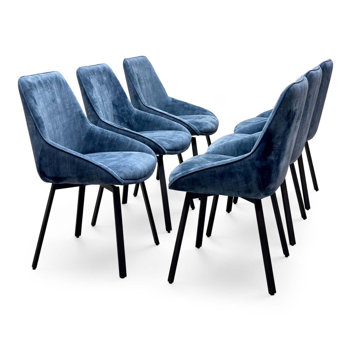 Veja heritage blue velvet set of 6 swivel dining chairs, front angle showing the curved seats and piping