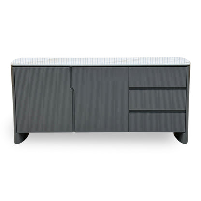 Front view of the Ivy grey high gloss large sideboard with 2 fluted doors, 3 drawers and a white ceramic top