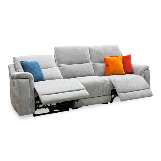 Berlin light grey linen fabric large 3 seater power recliner sofa with both end seats reclined, angled view