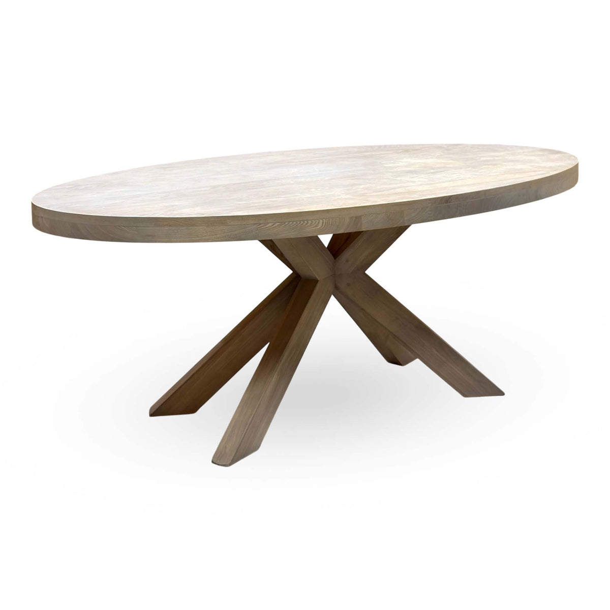 Falun smoked oak small oval dining table, angled view showing the crossed star leg base