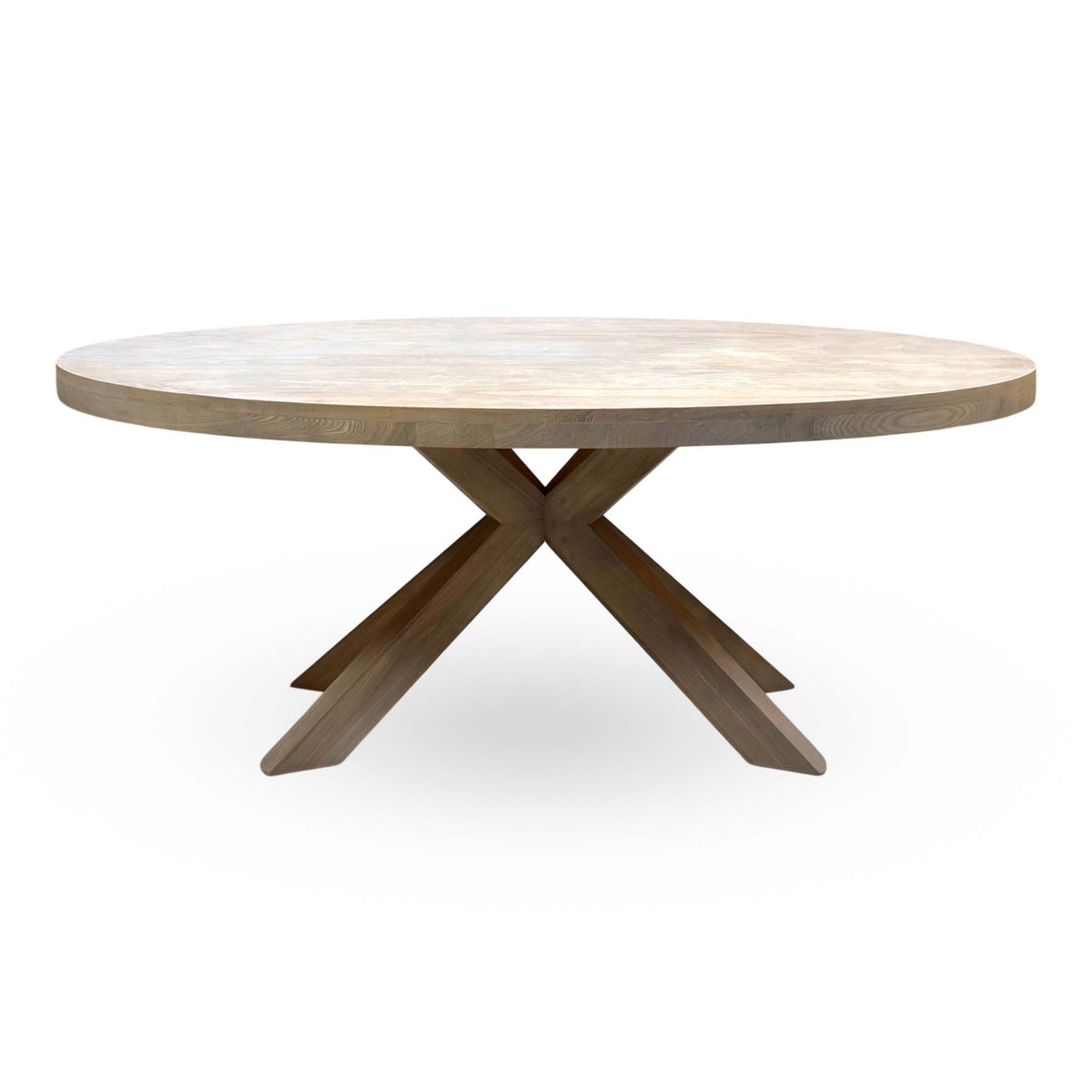 Side view of the Falun smoked oak small oval dining table with its crossed wooden star base
