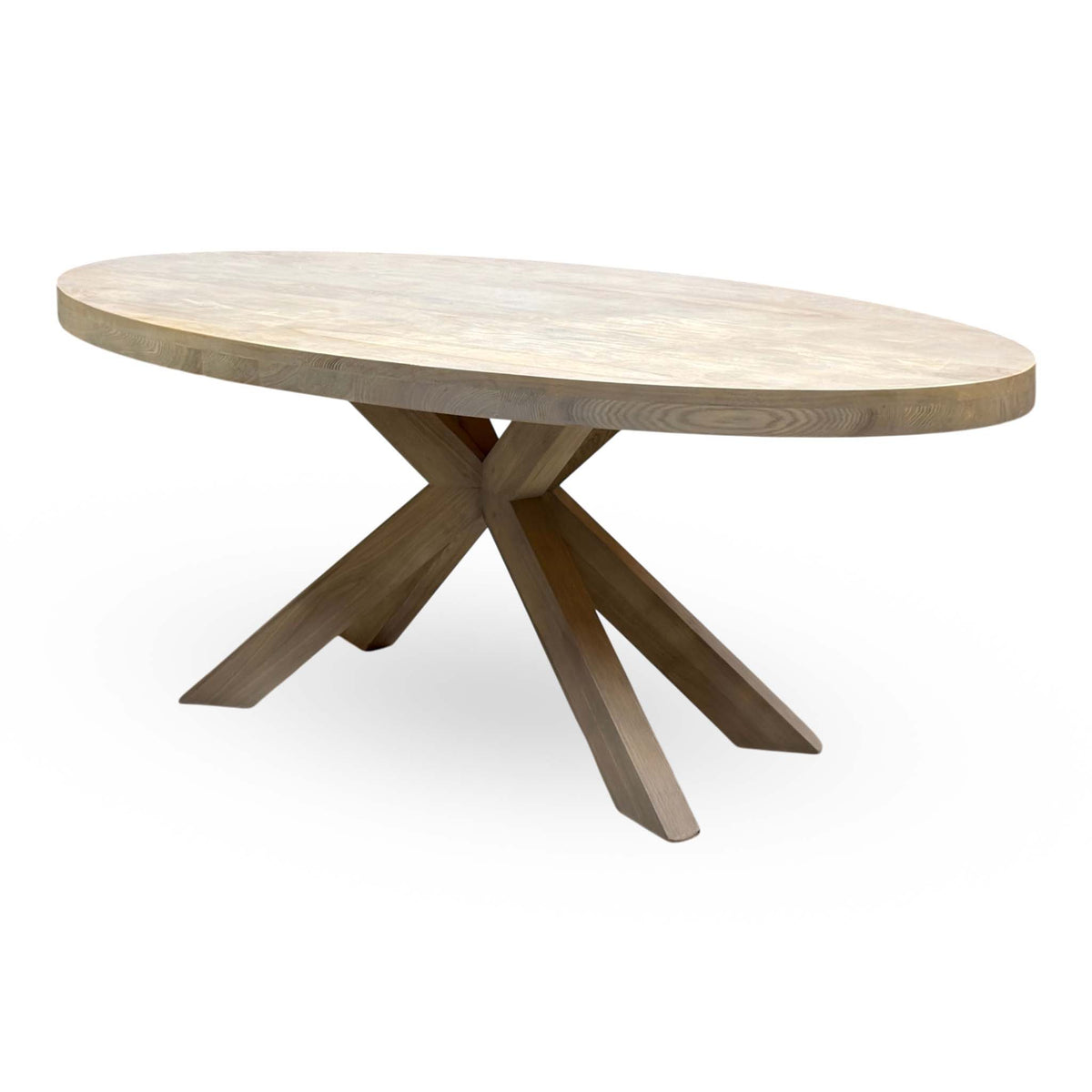 Falun smoked oak small oval dining table angled from the left, showing the long oval top