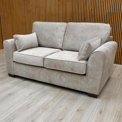 Detail shot focusing on the textured mink Kingston fabric and stitching on the armrest.