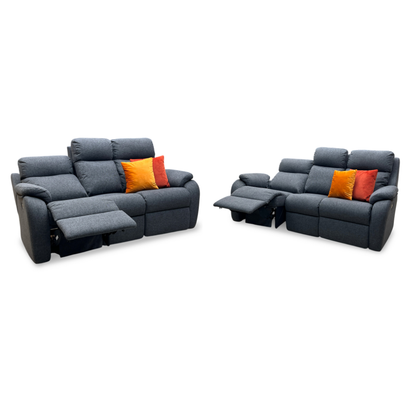 Full view of G Plan Kingsbury A943 Roche Slate Grey fabric 3-seater power recliner sofa front view. Premium triple-capacity luxury couch featuring supportive slate grey upholstery, independent electronic footrests, power headrests, and integrated power lumbar support.