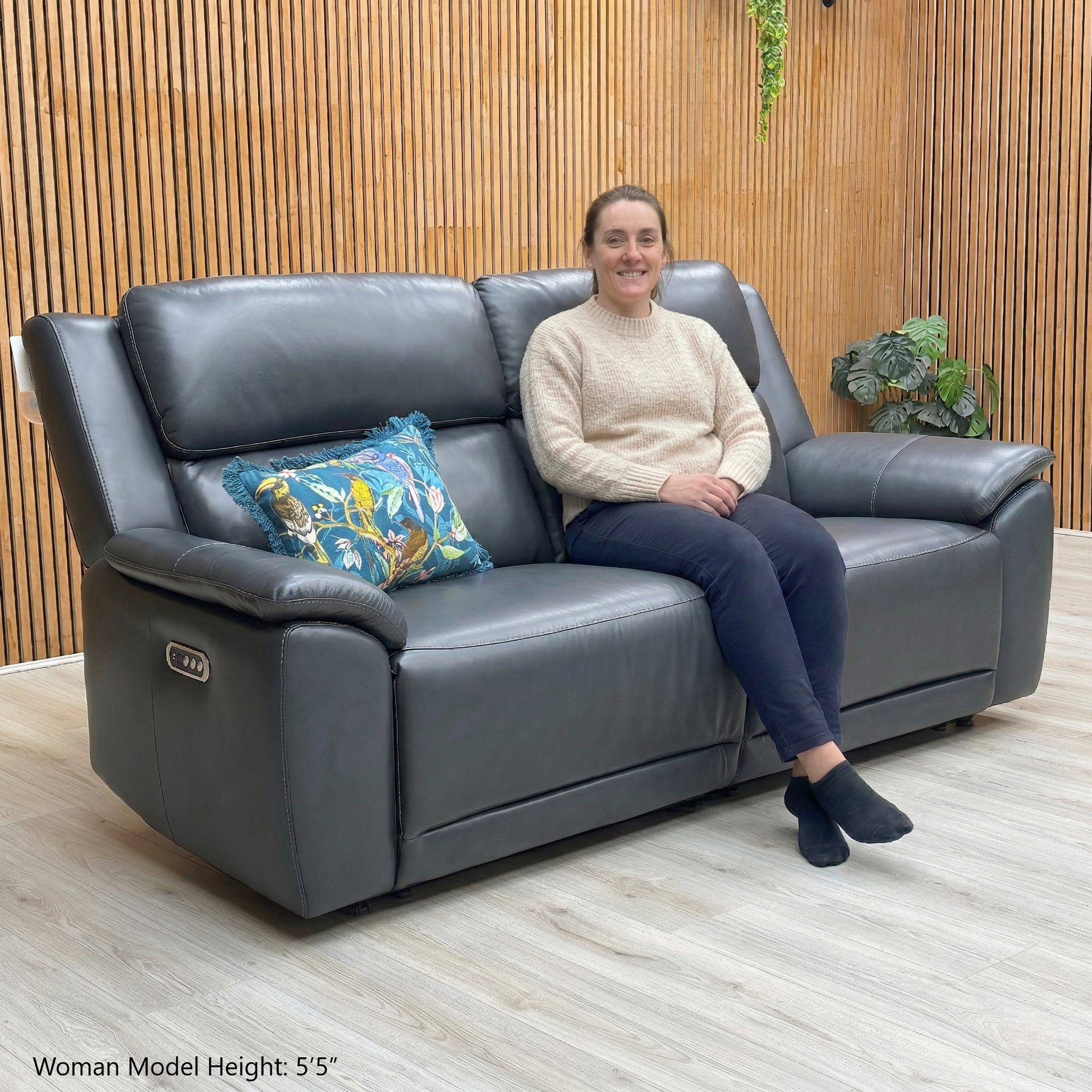 Lifestyle shot showing the Utah sofa with both end seats in a fully reclined position.
