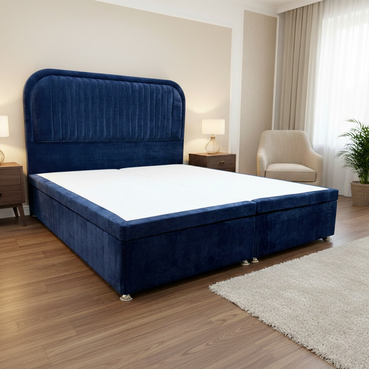 Living Room shot showing the deep buttoned detailing and contemporary navy fabric of the ‘Portland’ floor-standing headboard.