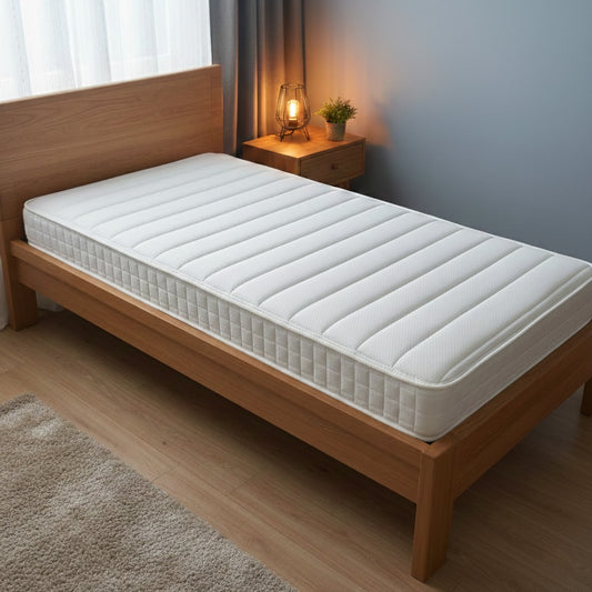 Bed Room shot of the kids' mattress, highlighting the hypoallergenic fillings and 600 individual pocket spring technology.