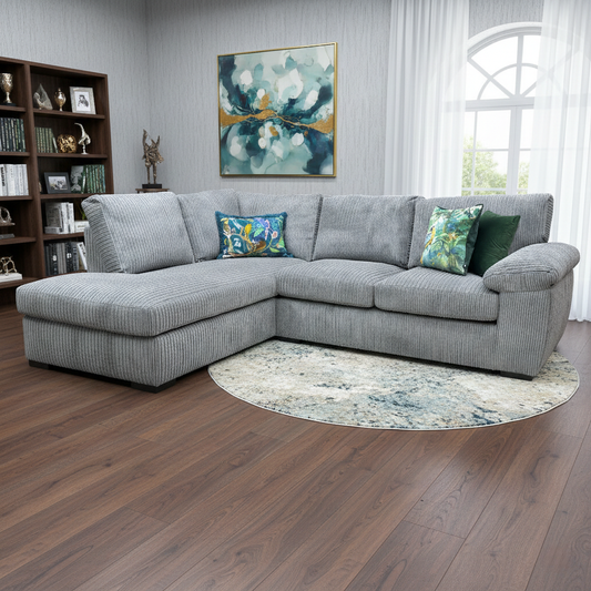 Living room of highlighting the deep chaise section and chunky cord texture of the 'Amalfi' sofa.