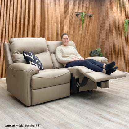 Lifestyle shot of the Amesbury leather sofa showing the high back and supportive cushioning.