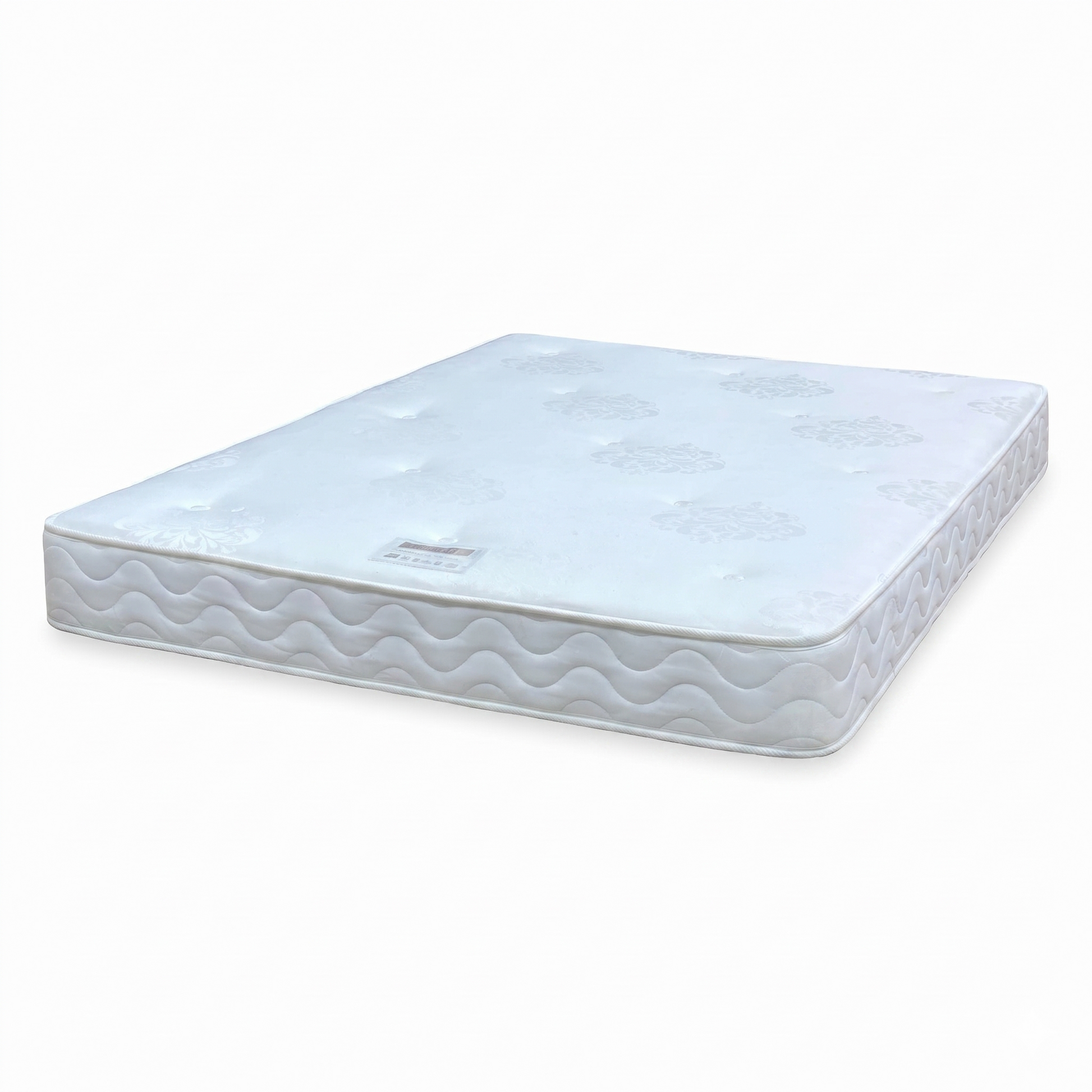Full view of the Capsule Collection ‘Essentials’ double mattress, featuring a traditional open coil spring system and a classic diamond-quilted stitch finish.