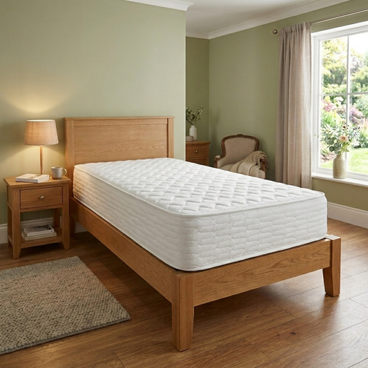 Bed room view Fabb ‘Upton’ Single Mattress featuring a white quilted top with a supportive firm high-density foam core.