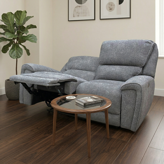 Living room view of the Ricky 2-seater sofa, showing the clean finish and uniform fabric coverage.