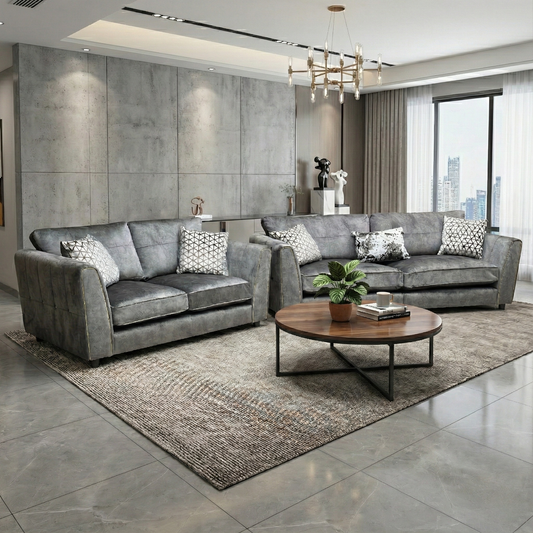 LIving room of the 4-seater sofa, highlighting the sloped arms and brass insert detailing.