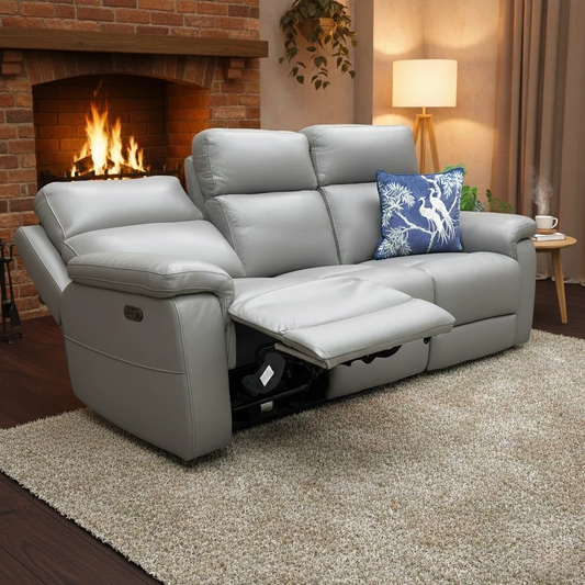 Living room View of the sofa with the footrests partially extended to demonstrate the reclining function.