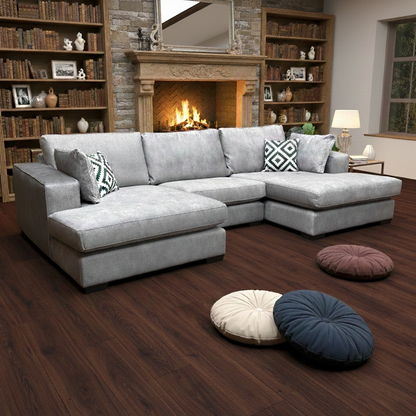 Living Room view of the 'Larry' sofa, highlighting the deep 160cm chaise ends and formal back design.