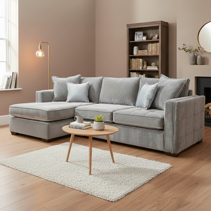 Living room of view of the 'Chelsea' sofa, highlighting its sleek profile and contemporary wood legs.