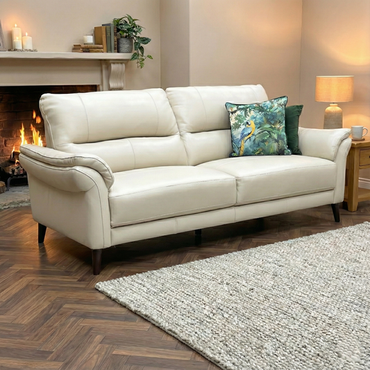 Living Room view highlighting the smooth leather finish and the classic silhouette of the Winner sofa.