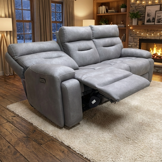 Living Room View  of the Cinemax sofa in a contemporary room, showcasing its grey fabric and curved design.