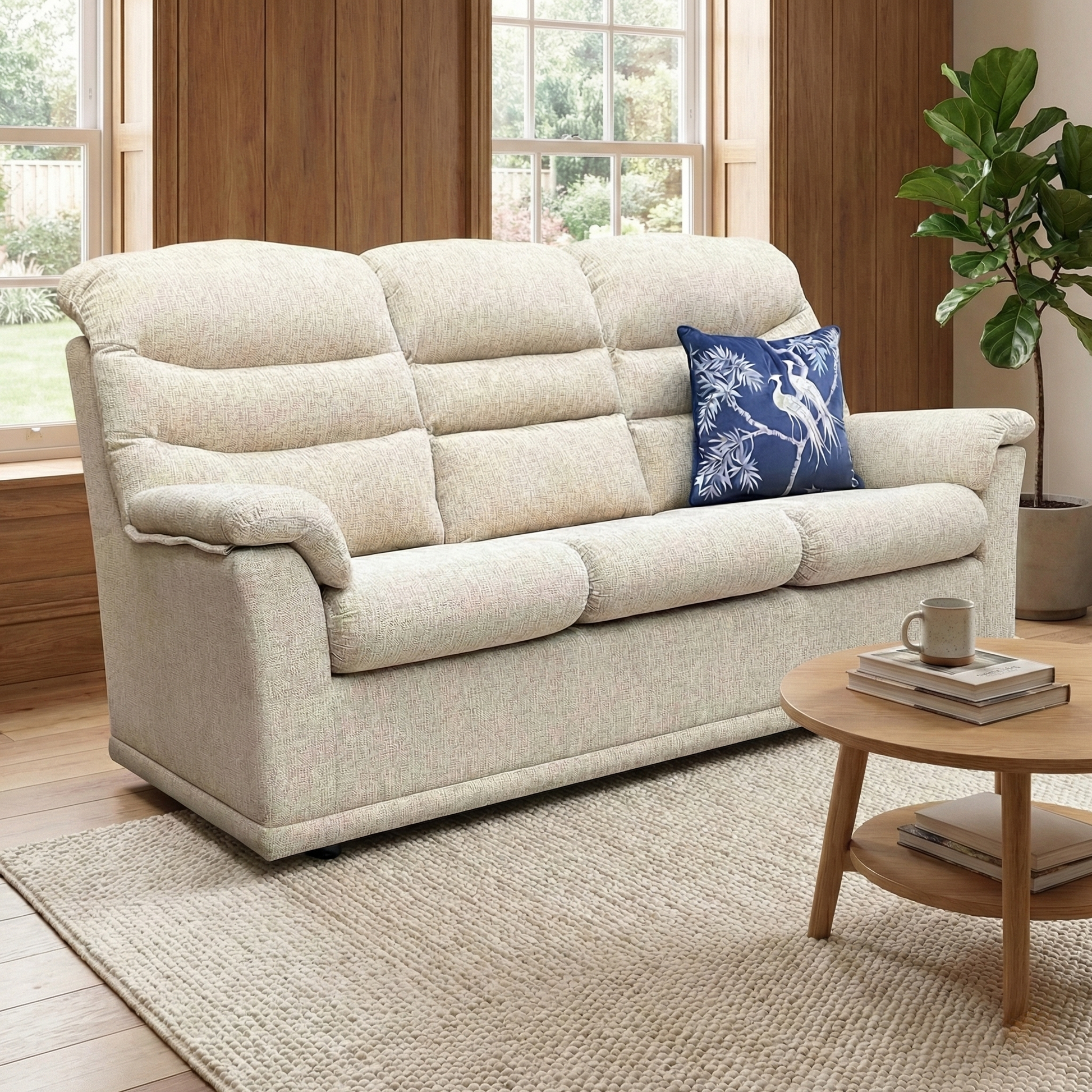 Living room of shot highlighting the Malvern's classic high-back design and padded scroll arms.