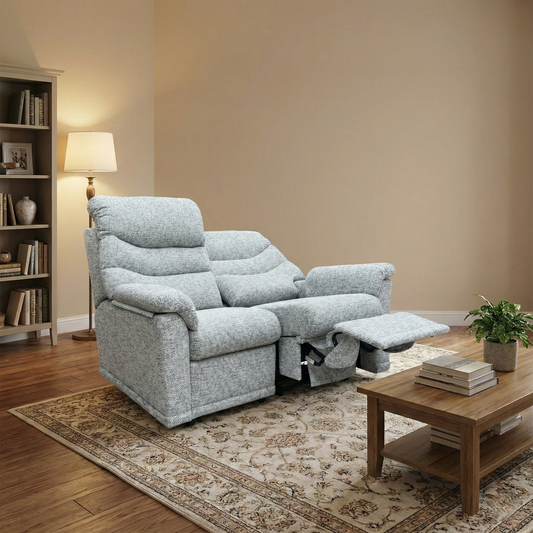  Living room of the G Plan Malvern sofa, highlighting the high-back design, textured grey fabric, and plush lumbar support.