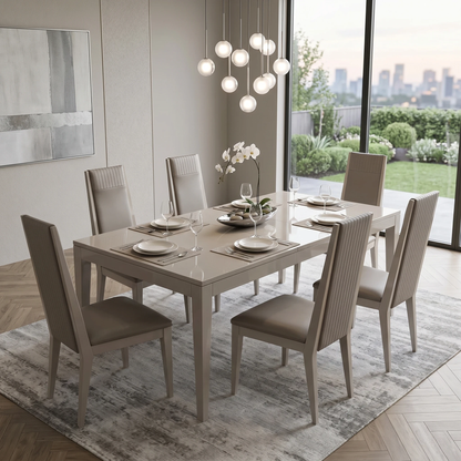 Dining room view for the Lusso Taupe dining chair set, highlighting the easy-clean faux leather upholstery, ergonomic support, and modern industrial aesthetic.