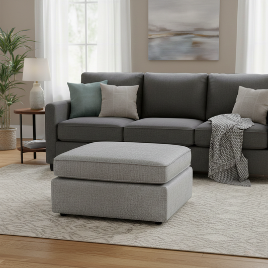 Living Room of the Emilia Stone woven footstool, highlighting the square silhouette and structured upholstery.