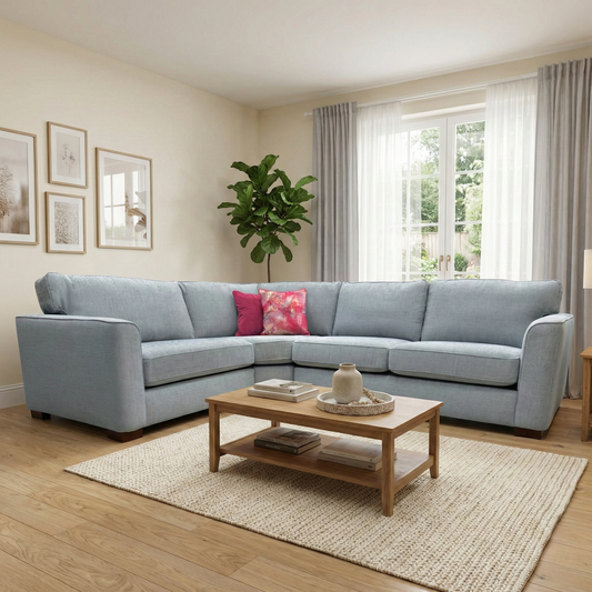 Living room of the 'Elora' corner sofa, highlighting the deep sea grey texture and generous seating capacity.