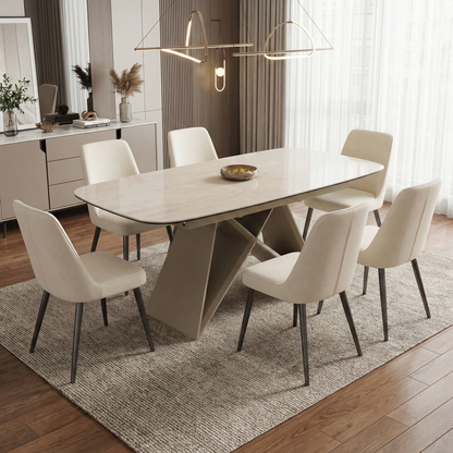 Living Room of the Mirage dining table, highlighting its architectural base with a modern powder-coated finish.