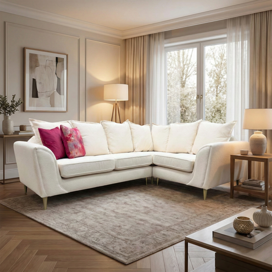Lifestyle shot of the Alyssia cream corner sofa, highlighting the spacious seating area and soft, textured boucle upholstery.
