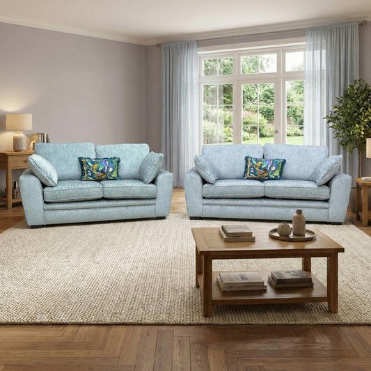 Lifestyle shot of the 'Chalfont' 3-seater sofa in a contemporary living room setting, highlighting the unique Eau De Nil green upholstery.