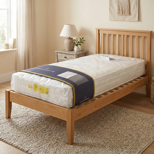 Bedroom view of the Tuscan Single Mattress, highlighting the deep-filled layers and the structured sidewalls for edge-to-edge support.