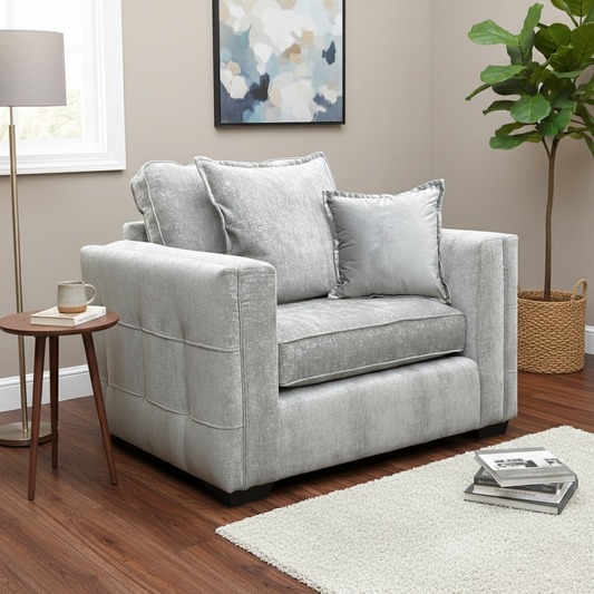 Lifestyle shot of the Chelsea Meridian Truffle soft weave snuggler chair in a modern living room setting, highlighting its cozy yet formal aesthetic.