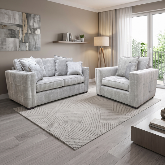 Styled upscale contemporary living room lifestyle layout featuring the Chelsea meridian truffle fabric 3-seater sofa and cuddler chair set arranged as a luxurious, cozy family lounge hub.