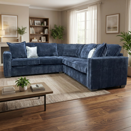Lifestyle shot of the Chelsea denim sofa in a modern lounge, emphasizing its cozy aesthetic and soft-touch Derwent fabric.