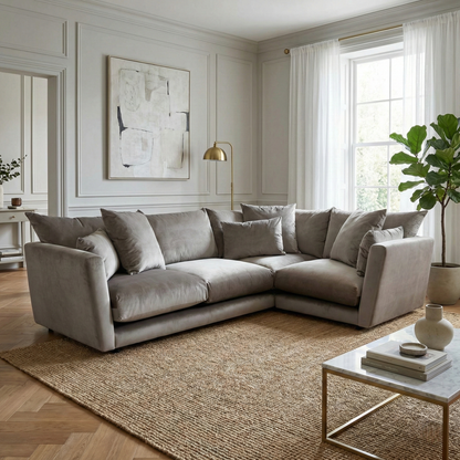 Lifestyle shot of the mink velvet corner sofa in a modern living space, emphasizing its sophisticated silhouette and premium aesthetic.