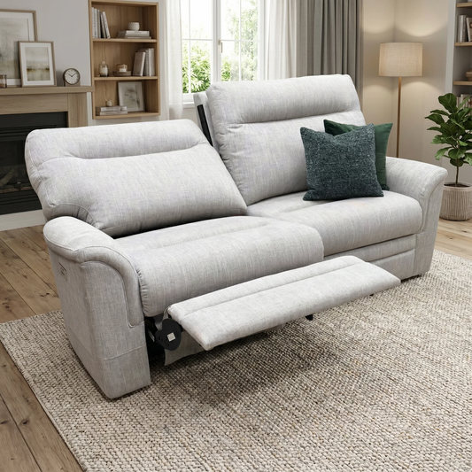 Living room view for the Hudson large 2-seater power recliner sofa, highlighting the premium tight-weave fabric, integrated power mechanisms, and British craftsmanship.