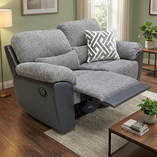 Living room of the 'Santori' charcoal sofa, highlighting the comfortable pad arm style.