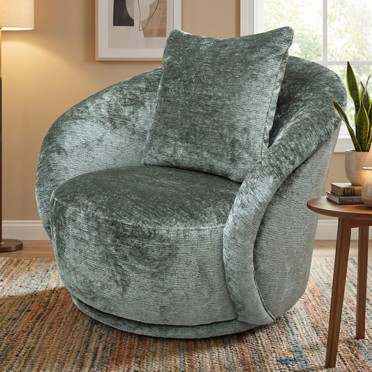 Living Room view of the Jasper accent chair, highlighting its rich moss green colour and textured chenille upholstery.