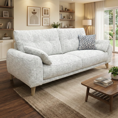 Living room of the Malmo sofa, highlighting its Fab-Mga-R06 Silver Green upholstery, wide inviting seats, and Scandi-inspired aesthetic.