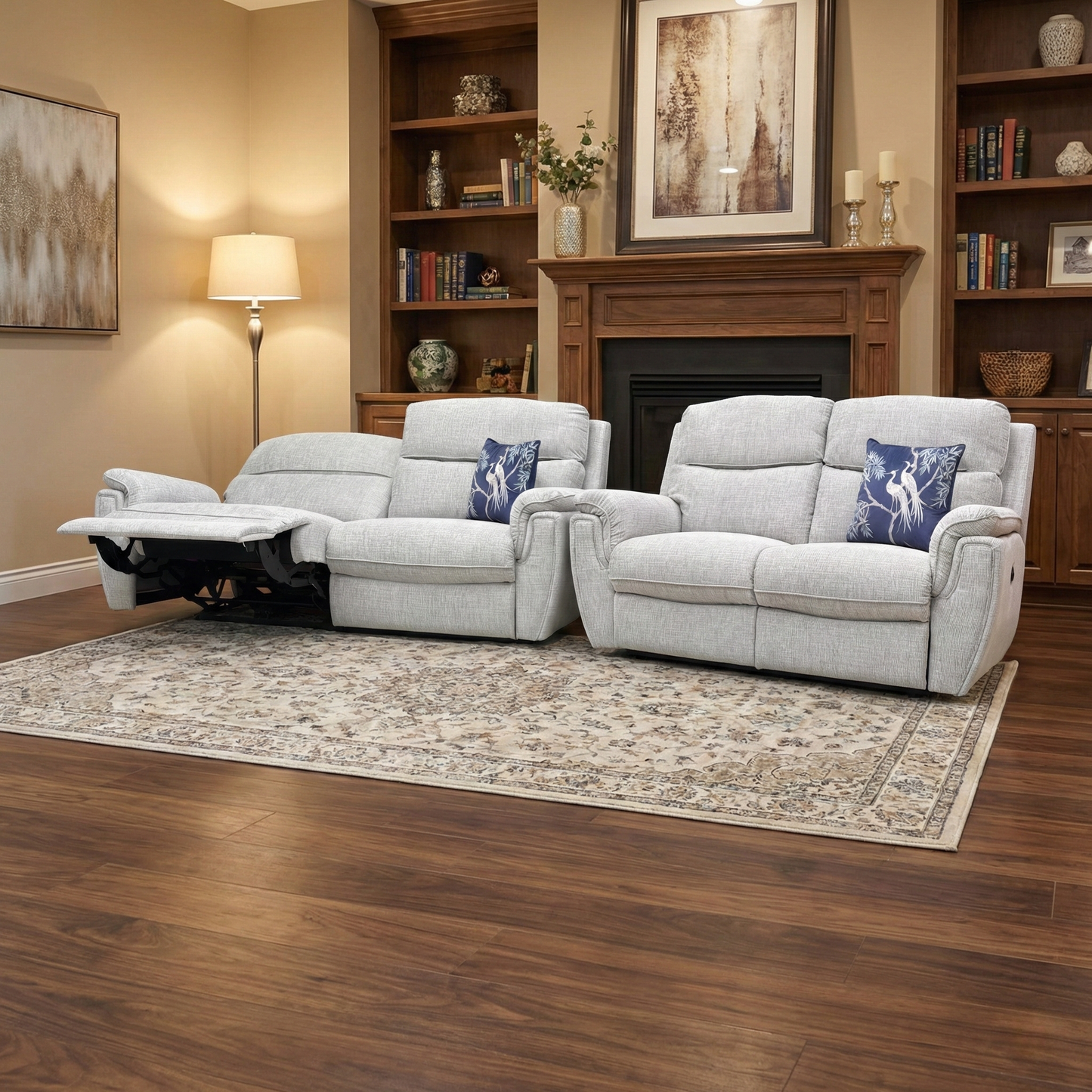 Living Room view of the Ashton 3-seater power recliner in Bariba Grey, showcasing the plush cushioning and sleek chrome detail on the armrests.