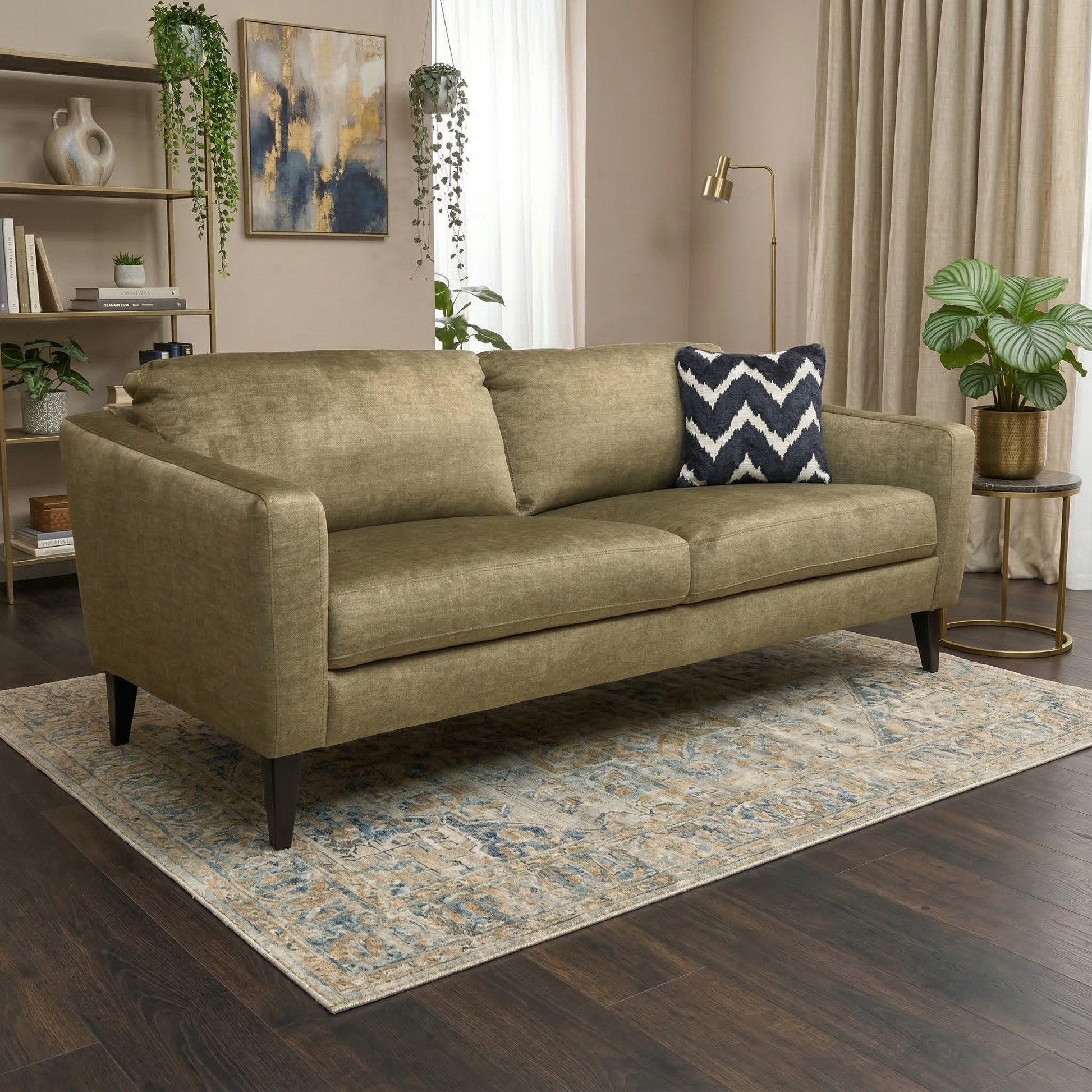 Living room view for the Oslo 3-seater sofa, highlighting the luxurious Olive Green velvet, high-resilience foam seating, and durable kiln-dried hardwood frame.