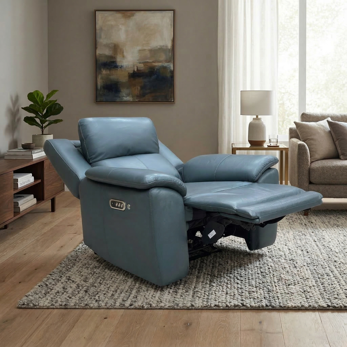 Living room for the Utah power recliner, highlighting the premium matte leather, power headrest, power lumbar, and luxury heated seat functionality.
