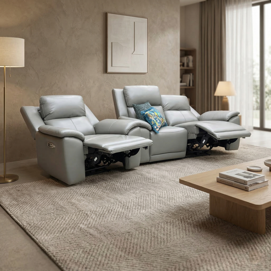 Living room view of the Natural Ash Grey leather Utah sofa set styled in a modern living space, showcasing its premium 100% leather upholstery and luxury heated seat features.