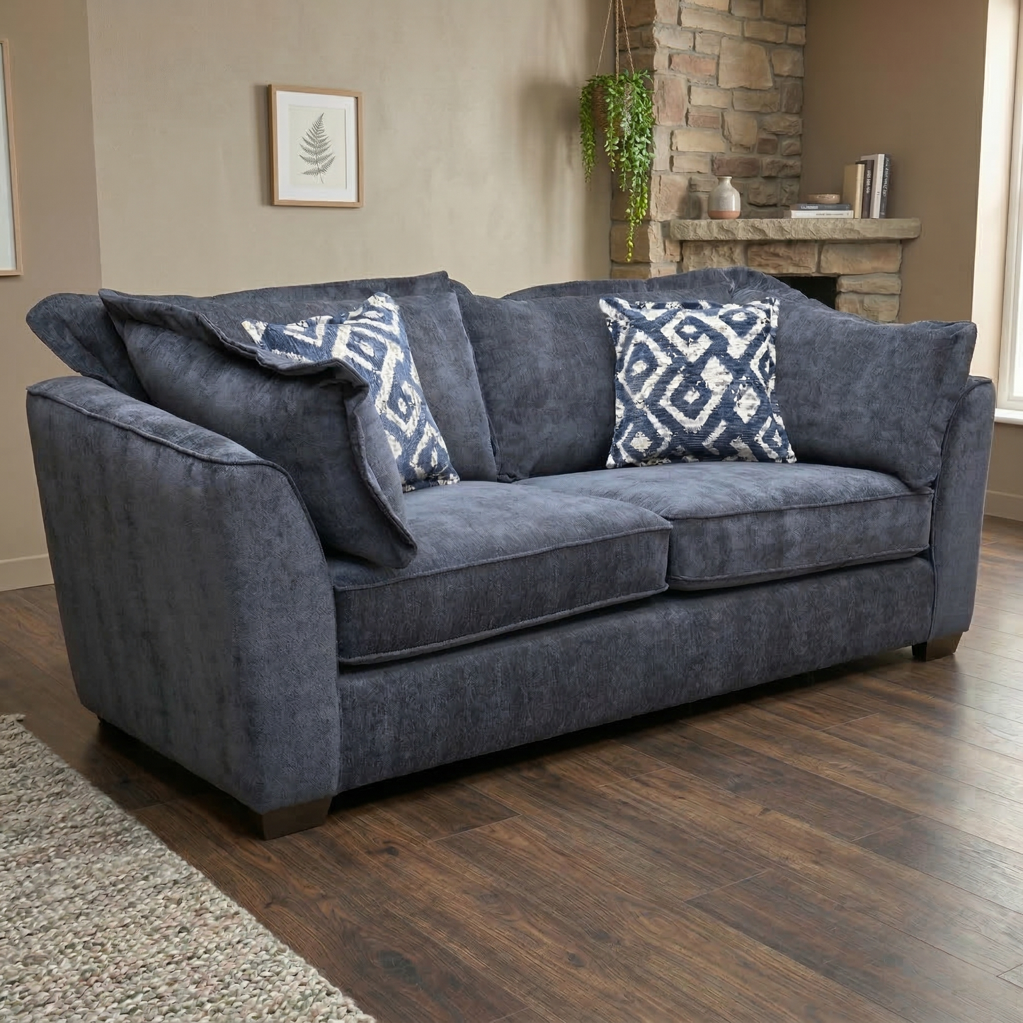 Living room view for the Finchley 3-seater sofa, highlighting the durable Denim Blue soft weave fabric, high-resilience foam seating, and sturdy hardwood frame.