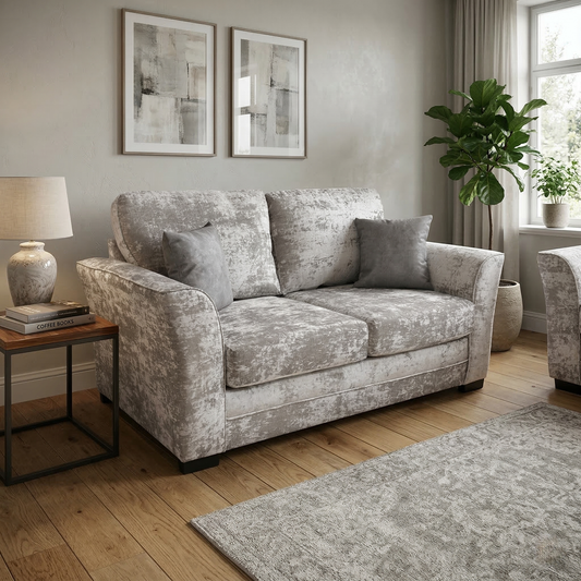 Living room view of Silver chenille Albany sofa bed styled in a contemporary living room, highlighting its compact and welcoming silhouette.