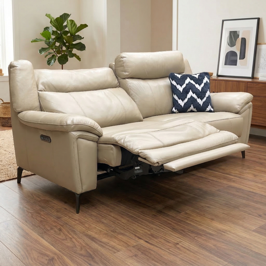 Living room view showcasing the Panache cream leather sofa in a bright, modern living room setting.