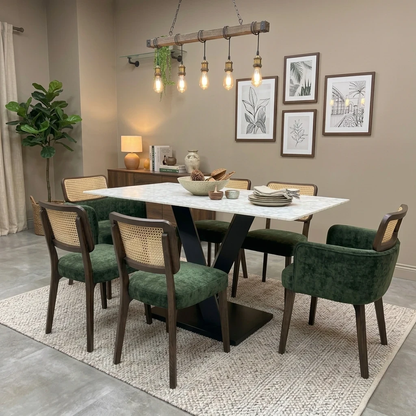 Living room view of a stylish interior setup of the Warrior Crystal White dining table, showing its compact design and marble-effect surface in a contemporary dining room.
