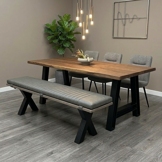 Living room view Scandinavian-style dining setup featuring the Loki solid oak bench with X-shaped legs, showcasing its rustic yet modern aesthetic.
