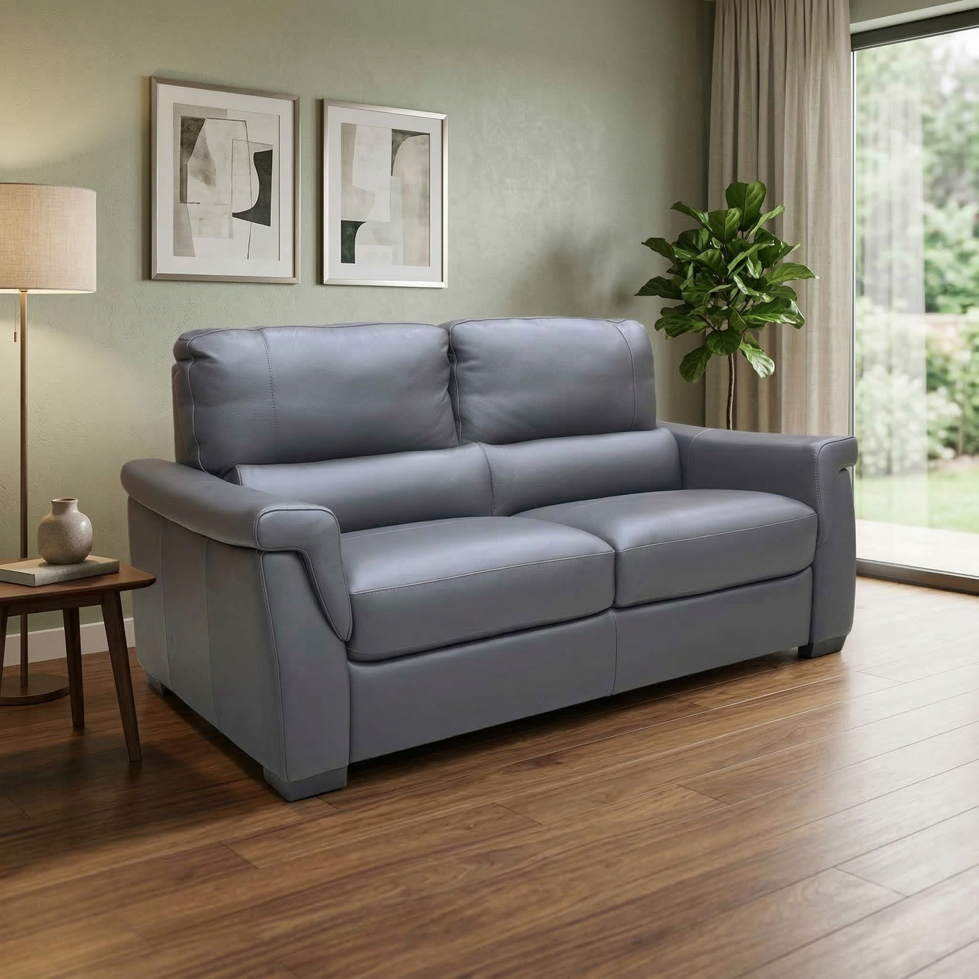 Living room view for the Amore 3-seater leather sofa, highlighting the premium Cat-50 leather upholstery, durable and easy-to-maintain finish, and its sophisticated contemporary style.
