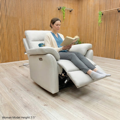 Lifestyle scene showing the Sally leather recliner paired with minimalist home decor and soft indoor lighting.